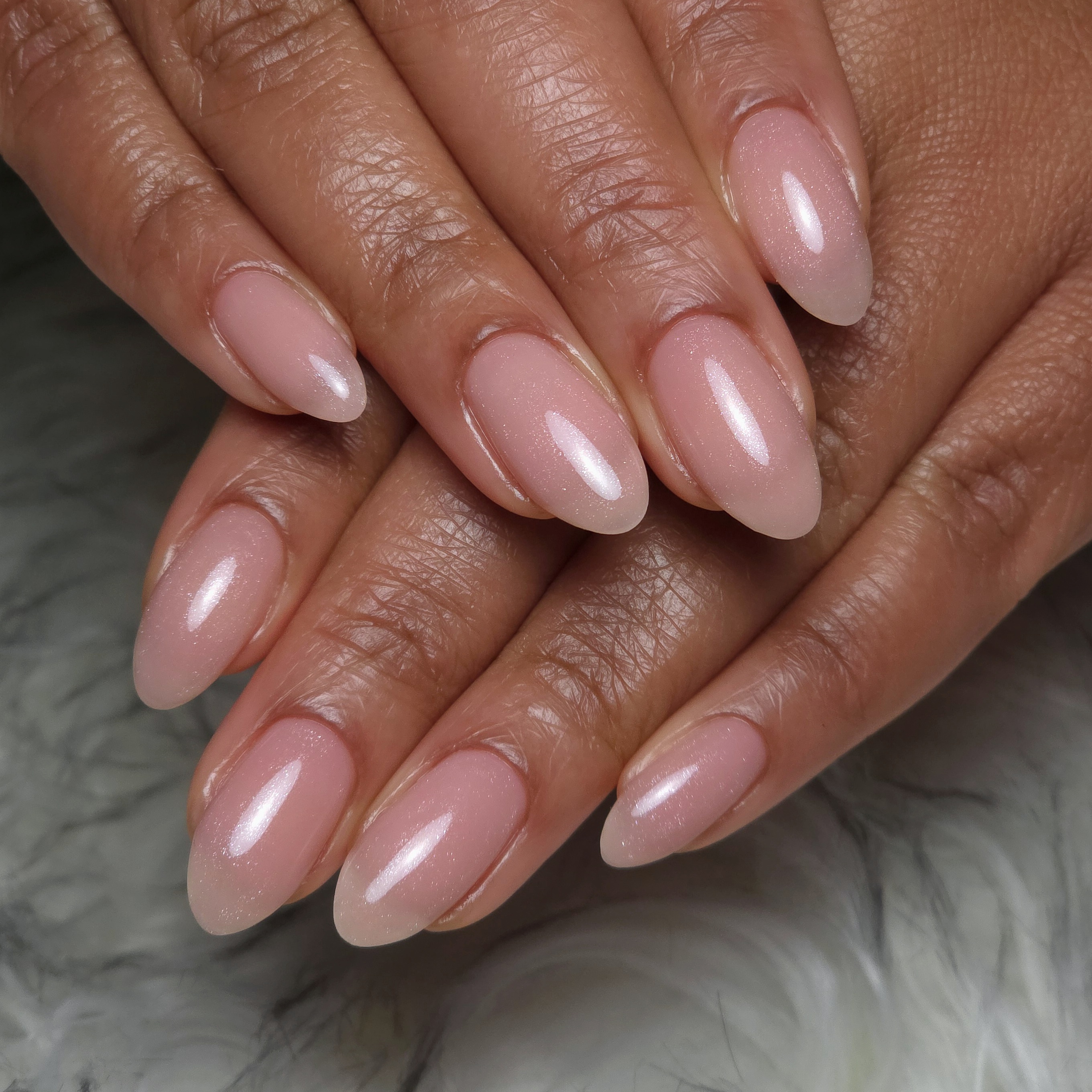 Glossy purple-toned Russian manicure